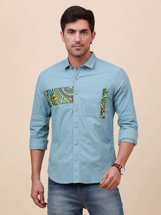 Pale Teal Solid Single Pocket Shirt shop online at Estilocus. 100% Cotton ,Full-sleeve solid shirt Cut and sew placket Regular collar Double button edge cuff Single pocket Curved bottom hemline HD elegant printing at front placket and pocket. All double n