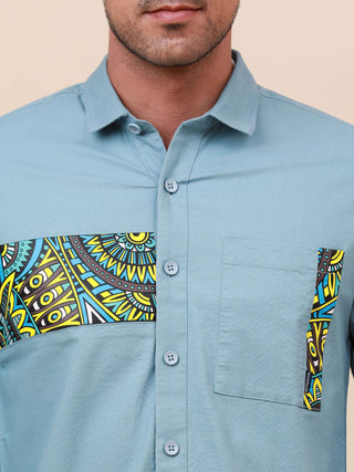 Pale Teal Solid Single Pocket Shirt shop online at Estilocus. 100% Cotton ,Full-sleeve solid shirt Cut and sew placket Regular collar Double button edge cuff Single pocket Curved bottom hemline HD elegant printing at front placket and pocket. All double n