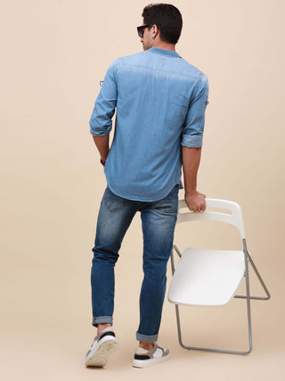 Blue Denim Double Pocket Shirt shop online at Estilocus. Denim ,Full-sleeve shirt cut and sew placket. Regular collar Double button edge cuff Double pocket with flap Curved bottom hemline HD elegant print @ panel All Double needle construction, finest qua