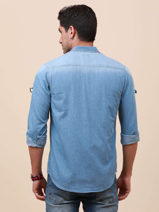 Blue Denim Double Pocket Shirt shop online at Estilocus. Denim ,Full-sleeve shirt cut and sew placket. Regular collar Double button edge cuff Double pocket with flap Curved bottom hemline HD elegant print @ panel All Double needle construction, finest qua