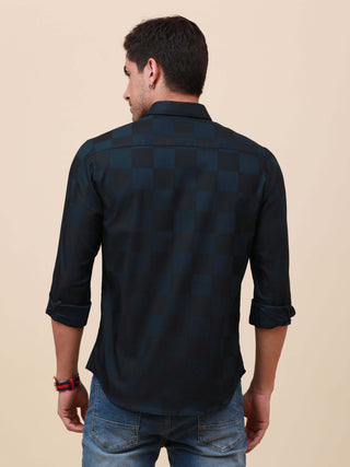 Navy Check Pocketless Shirt shop online at Estilocus. 100% Cotton ,Full-sleeve checks shirt self fold placket Regular collar Double button edge cuff pocketless Curved bottom hemline Finest quality brand embroidery at front placket. All sinlge needle const