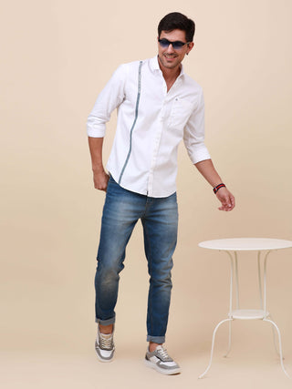 White Solid Single Pocket Shirt shop online at Estilocus. 100% Cotton ,Full-sleeve solid shirt Cut and sew placket Regular collar Double button edge cuff Single pocket Curved bottom hemline Finest printing at front placket. All double needle construction,