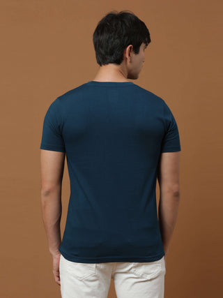 Estilocus Teal Blue Crew Neck Printed T Shirt shop online at Estilocus. 100% Cotton Designed and printed on knitted fabric. The fabric is stretchy and lightweight, with a soft skin feel and no wrinkles. Crew neck collar which is smooth on the neck and kee