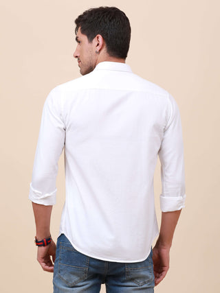 White Solid Single Pocket Shirt shop online at Estilocus. 100% Cotton ,Full-sleeve solid shirt Cut and sew placket Regular collar Double button edge cuff Single pocket Curved bottom hemline Finest printing at front placket. All double needle construction,