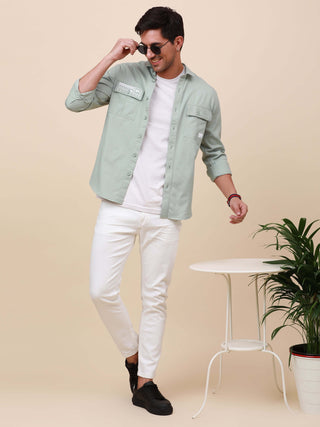 Mint Green Solid Double Pocket Shirt shop online at Estilocus. 100% Cotton , Full-sleeve solid shirt Cut and sew placket Regular collar Double button edge cuff Double pocket with flap Curved bottom hemline Finest printing at pocket . All double needle con