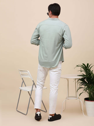 Mint Green Solid Double Pocket Shirt shop online at Estilocus. 100% Cotton , Full-sleeve solid shirt Cut and sew placket Regular collar Double button edge cuff Double pocket with flap Curved bottom hemline Finest printing at pocket . All double needle con