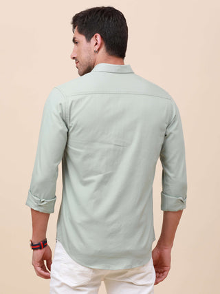 Mint Green Solid Double Pocket Shirt shop online at Estilocus. 100% Cotton , Full-sleeve solid shirt Cut and sew placket Regular collar Double button edge cuff Double pocket with flap Curved bottom hemline Finest printing at pocket . All double needle con