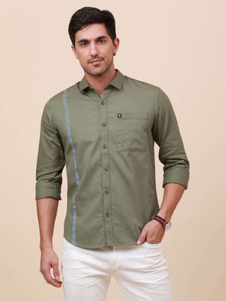 Olive Green Solid Single Pocket Shirt shop online at Estilocus. 100% Cotton ,Full-sleeve solid shirt Cut and sew placket Regular collar Double button edge cuff Single pocket Curved bottom hemline Finest printing at front placket. All double needle constru