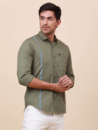 Olive Green Solid Single Pocket Shirt shop online at Estilocus. 100% Cotton ,Full-sleeve solid shirt Cut and sew placket Regular collar Double button edge cuff Single pocket Curved bottom hemline Finest printing at front placket. All double needle constru