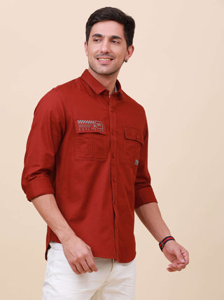 Rust Brown Solid Double Pocket Shirt shop online at Estilocus. 100% Cotton , Full-sleeve solid shirt Cut and sew placket Regular collar Double button edge cuff Double pocket with flap Curved bottom hemline Finest printing at pocket . All double needle con