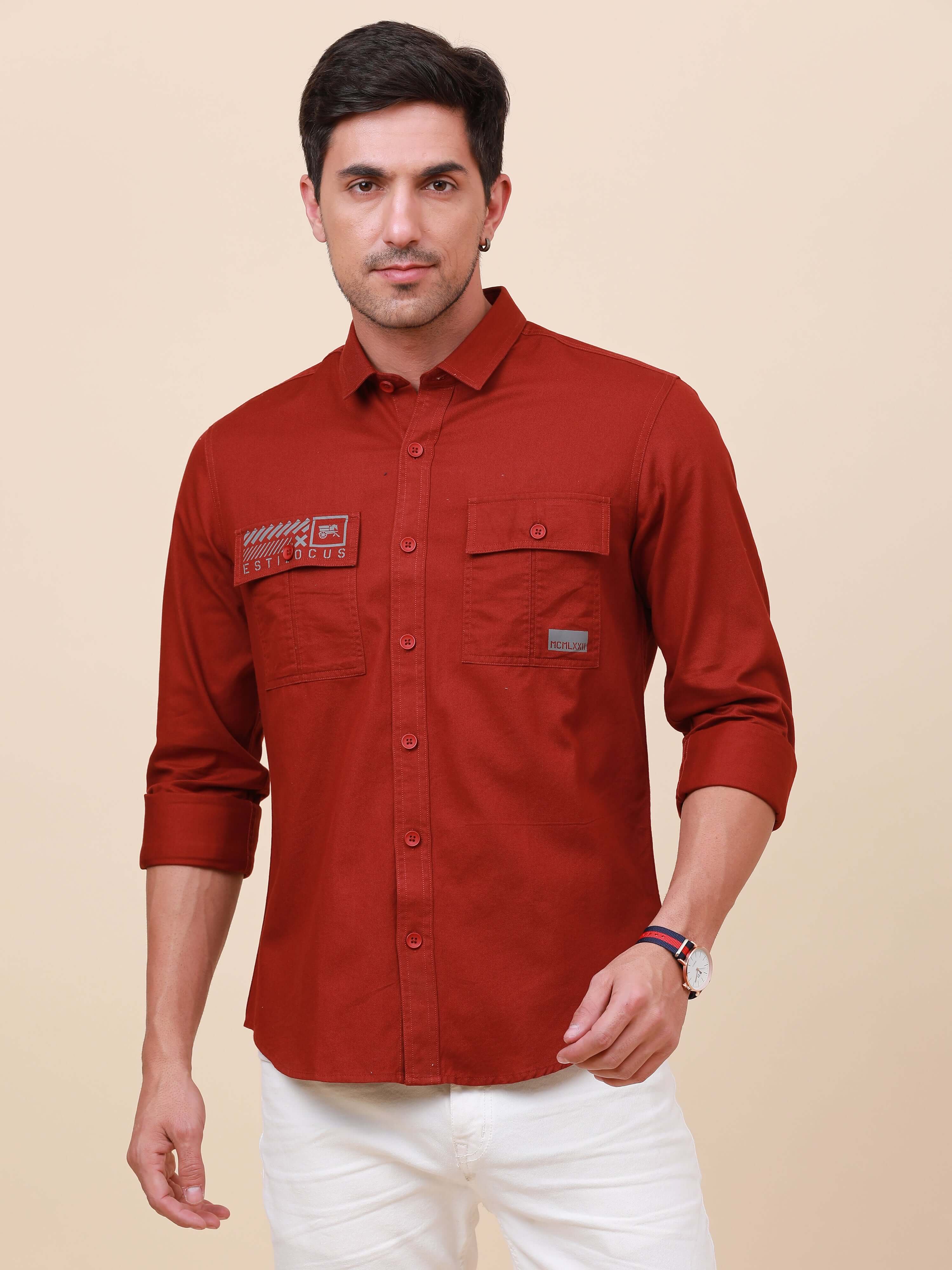 Rust Brown Solid Double Pocket Shirt shop online at Estilocus. 100% Cotton , Full-sleeve solid shirt Cut and sew placket Regular collar Double button edge cuff Double pocket with flap Curved bottom hemline Finest printing at pocket . All double needle con