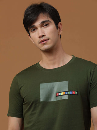 Estilocus Dk Olive Crew Neck Printed T Shirt shop online at Estilocus. 100% Cotton Designed and printed on knitted fabric. The fabric is stretchy and lightweight, with a soft skin feel and no wrinkles. Crew neck collar which is smooth on the neck and keep