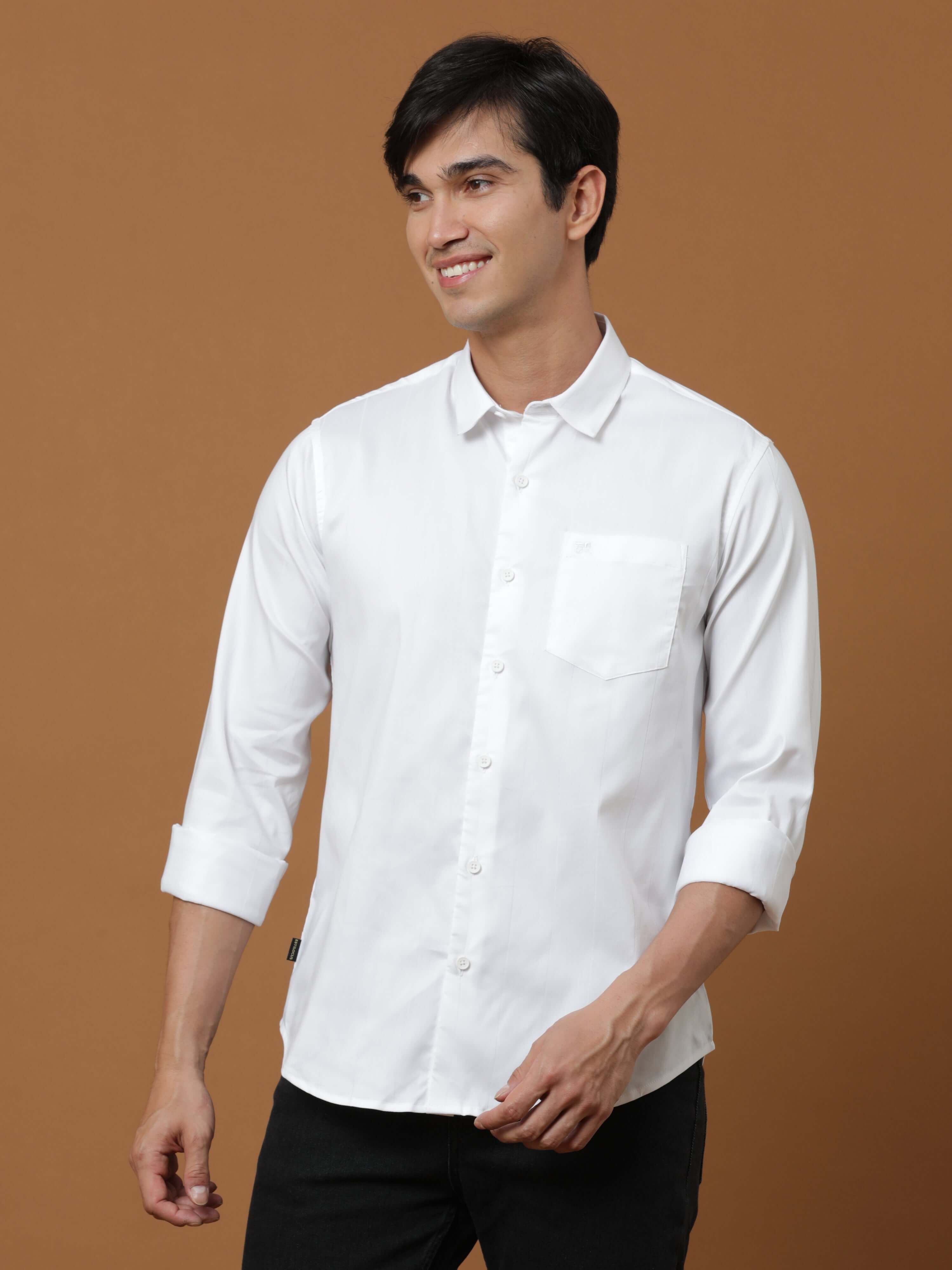 White Stripe Casual Shirt shop online at Estilocus. Poly Cotton Full-sleeve stripe shirt Self fold placket Regular collar Double button edge cuff Single pocket Curved bottom hemline Finest quality brand embroidery at front placket. All single needle const