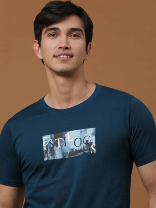 Vintage Teal Printed T Shirt shop online at Estilocus. 100% Cotton Designed and printed on knitted fabric. The fabric is stretchy and lightweight, with a soft skin feel and no wrinkles. Crew neck collar which is smooth on the neck and keeps you comfortabl