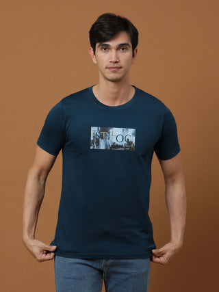 Vintage Teal Printed T Shirt shop online at Estilocus. 100% Cotton Designed and printed on knitted fabric. The fabric is stretchy and lightweight, with a soft skin feel and no wrinkles. Crew neck collar which is smooth on the neck and keeps you comfortabl