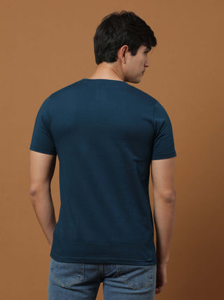 Vintage Teal Printed T Shirt shop online at Estilocus. 100% Cotton Designed and printed on knitted fabric. The fabric is stretchy and lightweight, with a soft skin feel and no wrinkles. Crew neck collar which is smooth on the neck and keeps you comfortabl