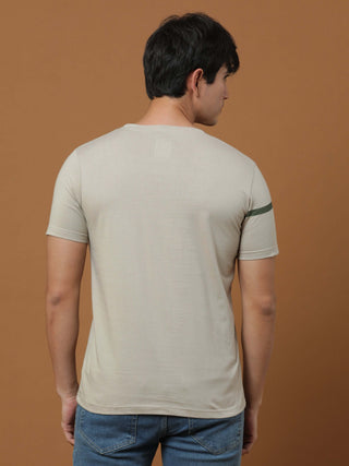 Raw&royal Beige Printed T Shirt shop online at Estilocus. 100% Cotton Designed and printed on knitted fabric. The fabric is stretchy and lightweight, with a soft skin feel and no wrinkles. Crew neck collar which is smooth on the neck and keeps you comfort