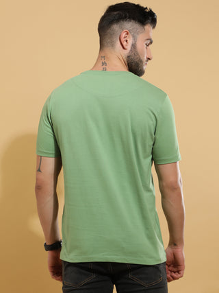 Green Crewneck T-Shirt shop online at Estilocus. This pure cotton printed T-shirt is a stylish go-to for laidback days. Cut in a comfy regular fit. • 100% Cotton knitted interlock 190GSM• Bio washed fabric• Round neck T-shirt • Half sleeve • Suits to wear