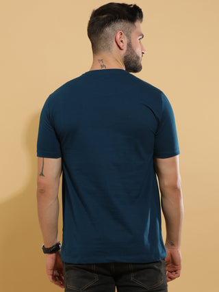 Teal Barcode Crewneck T-Shirt shop online at Estilocus. This pure cotton printed T-shirt is a stylish go-to for laidback days. Cut in a comfy regular fit. • 100% Cotton knitted interlock 190GSM• Bio washed fabric• Round neck T-shirt • Half sleeve • Suits