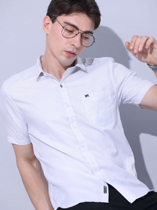 White Small Checks Casual Shirt shop online at Estilocus. • Half-sleeve small checks shirt • Cut and sew a placket. • Regular collar • Single pocket with logo embroidery • Curved hemline • Finest quality sewing • Machine wash care • Suitable to wear with