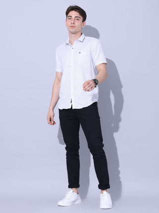 White Small Checks Casual Shirt shop online at Estilocus. • Half-sleeve small checks shirt • Cut and sew a placket. • Regular collar • Single pocket with logo embroidery • Curved hemline • Finest quality sewing • Machine wash care • Suitable to wear with