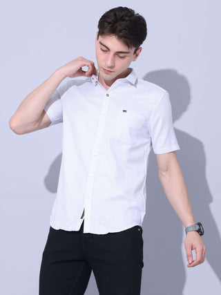 White Small Checks Casual Shirt shop online at Estilocus. • Half-sleeve small checks shirt • Cut and sew a placket. • Regular collar • Single pocket with logo embroidery • Curved hemline • Finest quality sewing • Machine wash care • Suitable to wear with