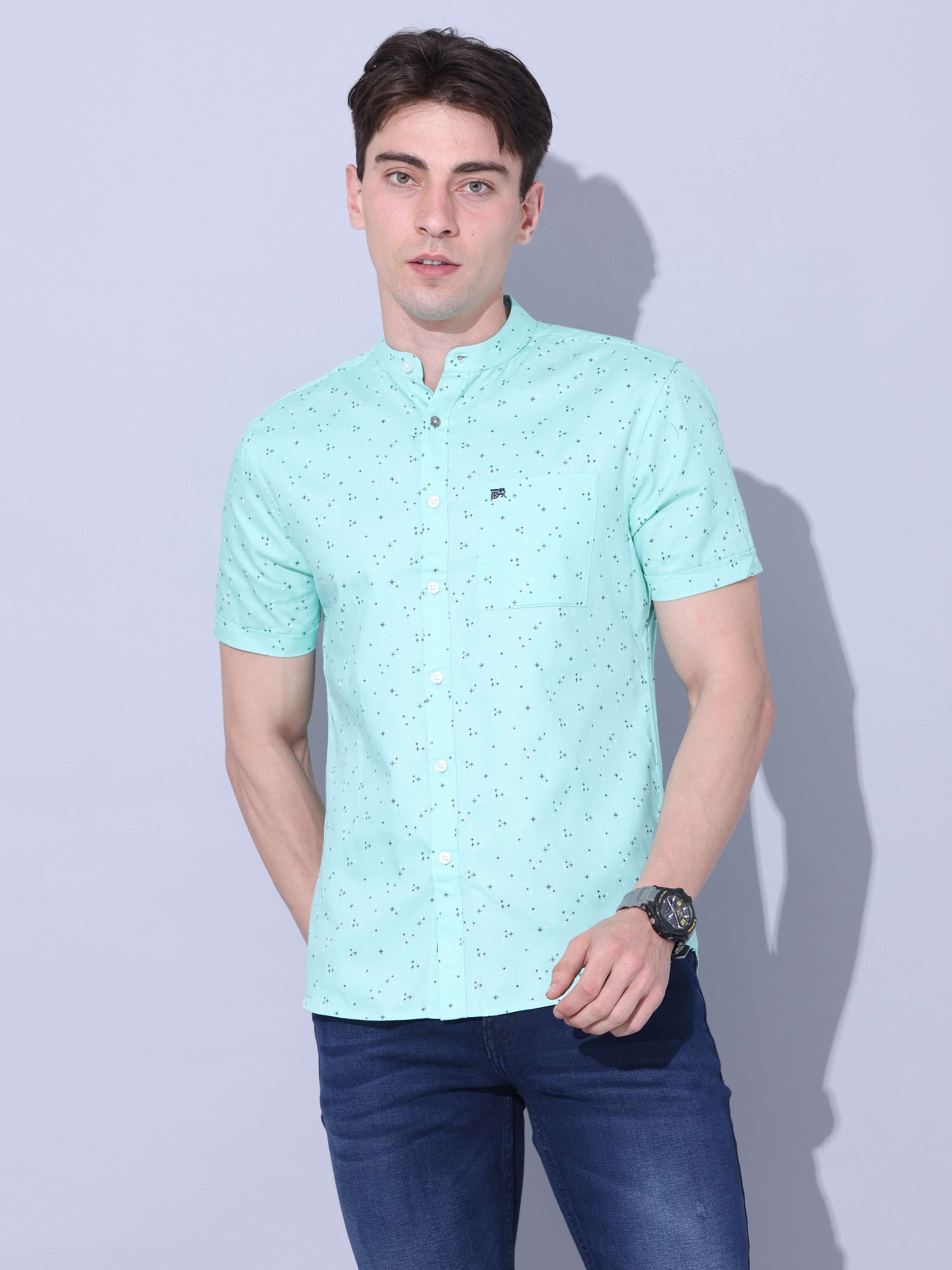 Parrot Green Casual Shirt shop online at Estilocus. • Half-sleeve printed shirt • Cut and sew placket • Regular collar • Single pocket with logo embroidery • Curved hemline • Finest quality sewing • Machine wash care • Suitable to wear with all types of b