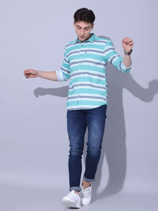 Green Stripe Casual Shirt shop online at Estilocus. •Geometric Stripe Print • Full sleeve shirt • Regular collar • Double button square cuff. • Single pocket with logo embroidery • Curved hemline • Finest quality sewing • Suitable to wear with all types o