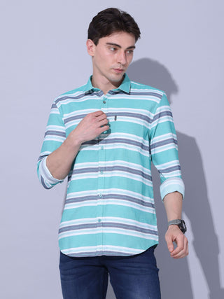 Green Stripe Casual Shirt shop online at Estilocus. •Geometric Stripe Print • Full sleeve shirt • Regular collar • Double button square cuff. • Single pocket with logo embroidery • Curved hemline • Finest quality sewing • Suitable to wear with all types o