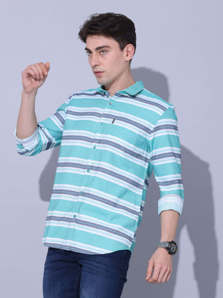 Green Stripe Casual Shirt shop online at Estilocus. •Geometric Stripe Print • Full sleeve shirt • Regular collar • Double button square cuff. • Single pocket with logo embroidery • Curved hemline • Finest quality sewing • Suitable to wear with all types o