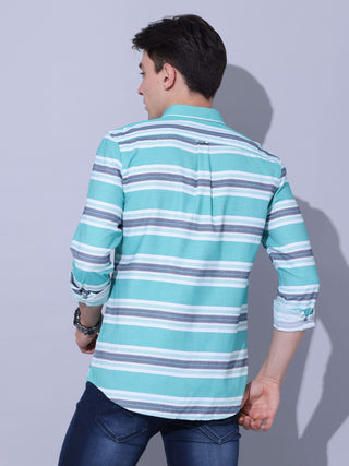 Green Stripe Casual Shirt shop online at Estilocus. •Geometric Stripe Print • Full sleeve shirt • Regular collar • Double button square cuff. • Single pocket with logo embroidery • Curved hemline • Finest quality sewing • Suitable to wear with all types o