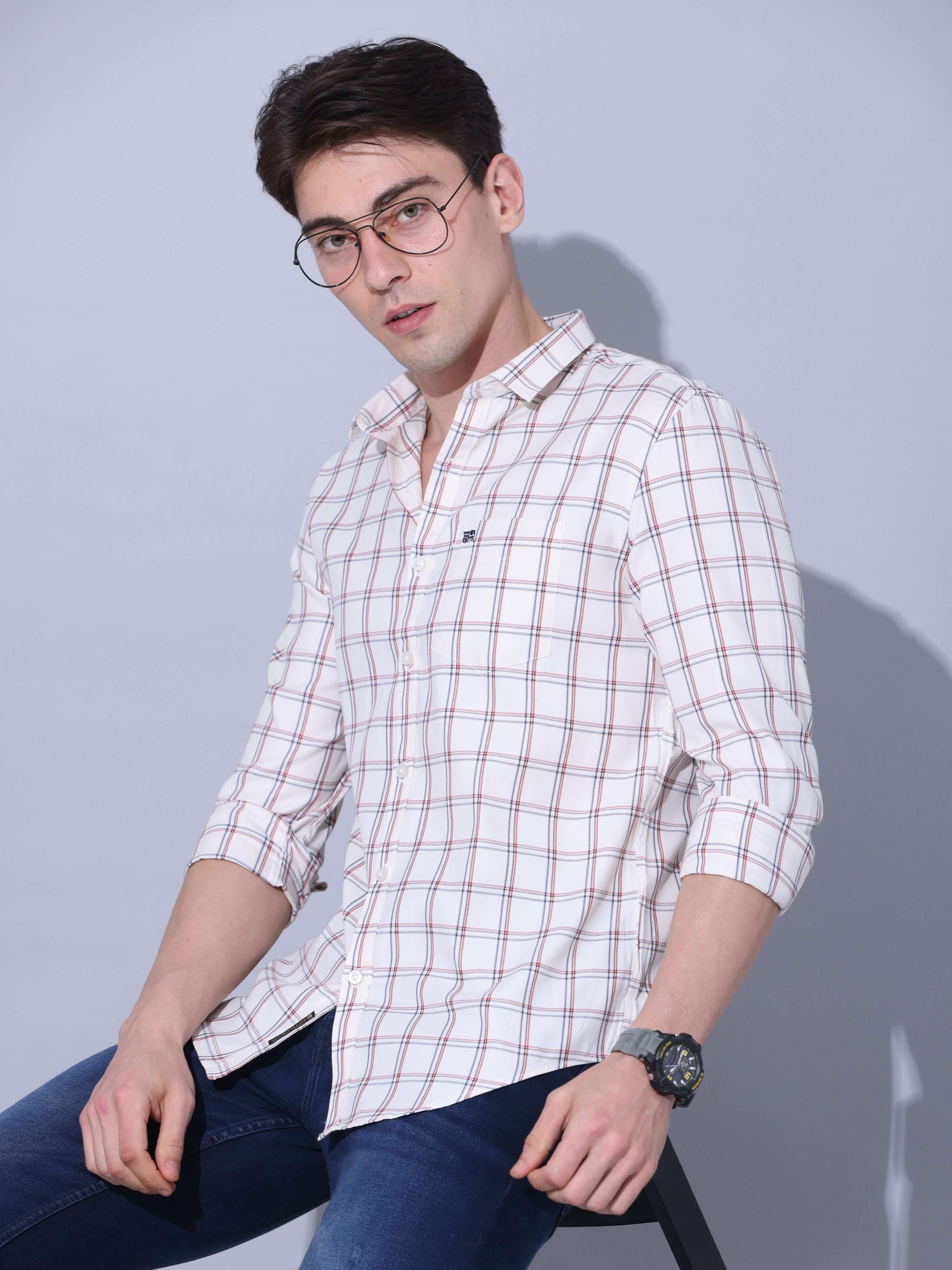 White Check Casual Shirt shop online at Estilocus. • Full-sleeve check shirt • Cut and sew placket • Regular collar • Double button square cuff. • Single pocket with logo embroidery • Curved hemline • Finest quality sewing • Machine wash care • Suitable t