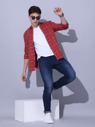 Red Check Casual Shirt shop online at Estilocus. • Checkered full sleeve shirt with regular collar and curved hem • Cut and sew placket • Double button square cuff • Single pocket with logo embroidery • Finest quality sewing • Suitable to wear with all ty