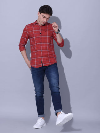 Red Check Casual Shirt shop online at Estilocus. • Checkered full sleeve shirt with regular collar and curved hem • Cut and sew placket • Double button square cuff • Single pocket with logo embroidery • Finest quality sewing • Suitable to wear with all ty