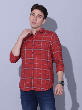 Red Check Casual Shirt shop online at Estilocus. • Checkered full sleeve shirt with regular collar and curved hem • Cut and sew placket • Double button square cuff • Single pocket with logo embroidery • Finest quality sewing • Suitable to wear with all ty