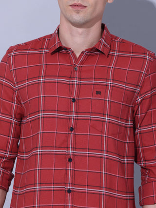 Red Check Casual Shirt shop online at Estilocus. • Checkered full sleeve shirt with regular collar and curved hem • Cut and sew placket • Double button square cuff • Single pocket with logo embroidery • Finest quality sewing • Suitable to wear with all ty